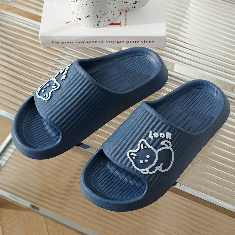 Women's green cat slippers with thick EVA platform sole, shown from above.