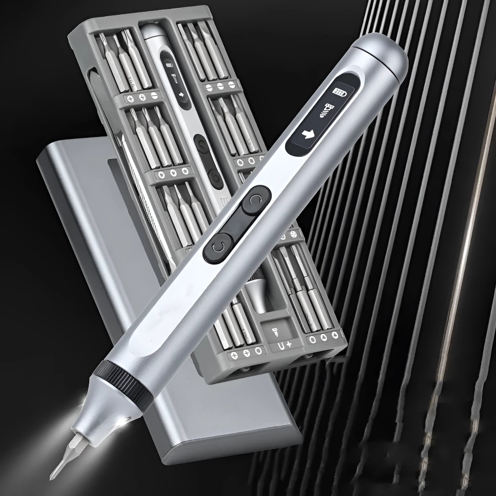 Aluminium bodied precision electric screwdriver on a workbench with a USB charging cable.