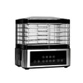 Silver stainless steel food dehydrator appliance with digital controls on a kitchen counter.