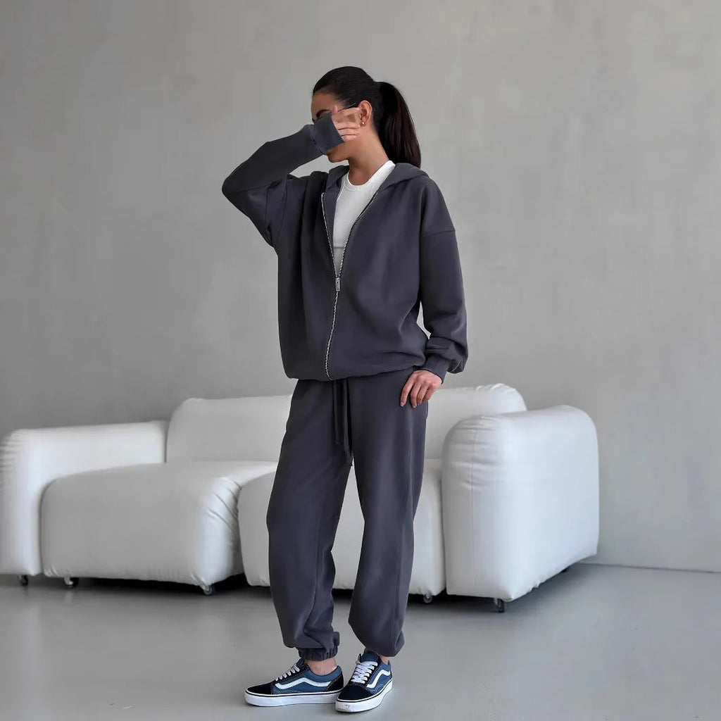 Street style two-piece set featuring long-sleeved coat and matching trousers in loose fit