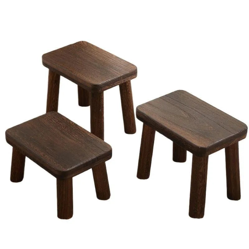 Distressed solid wood household stool with a bracket structure frame for shoe changing.