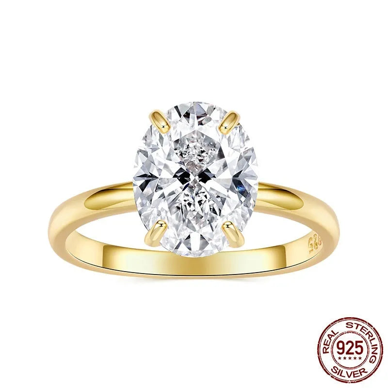 Silver oval cut zircon engagement ring with gold colour electroplating finish on white background