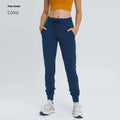 Women's high-waist yoga pants in distilled coffee colour with an elastic drawstring waist for fitness.