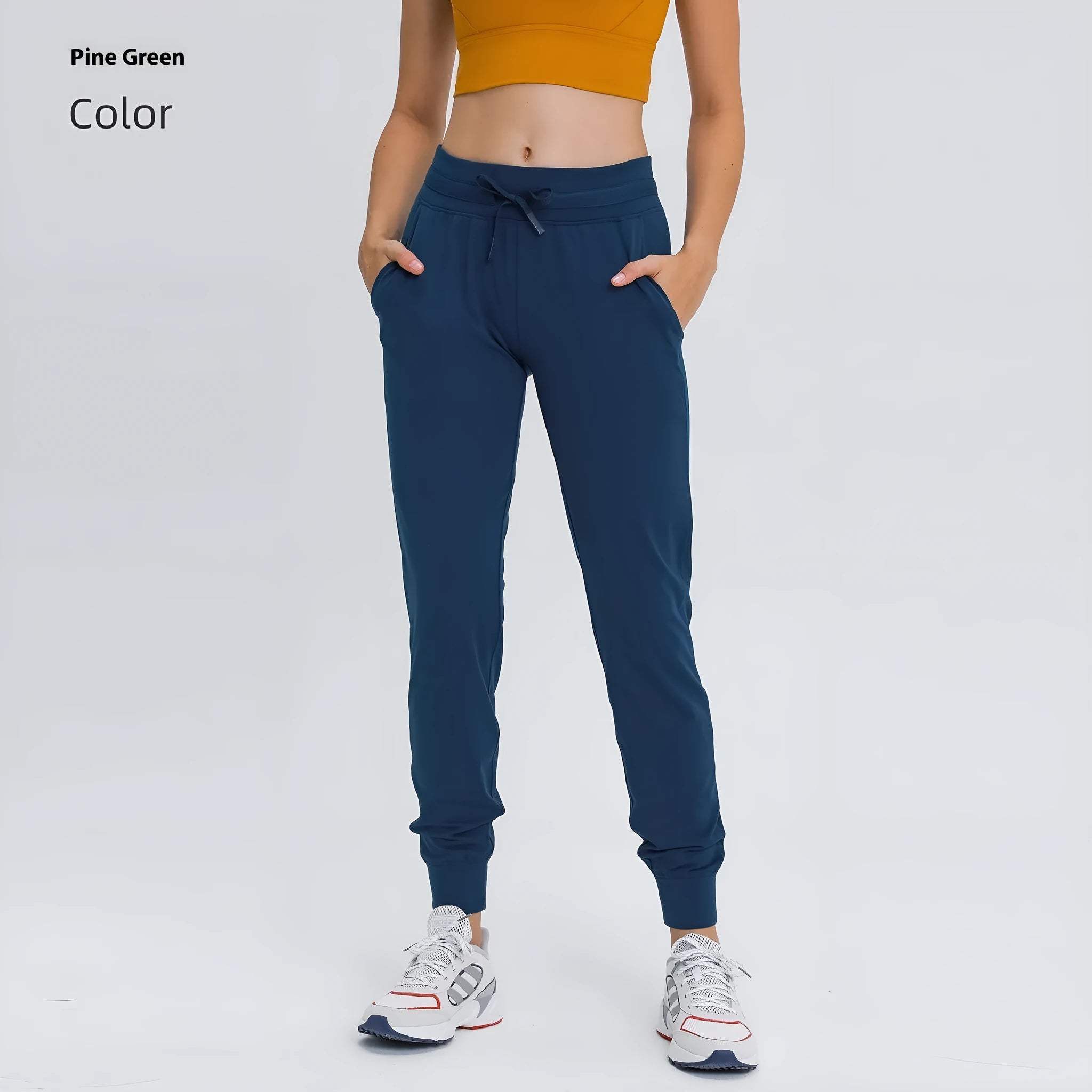 Women's high-waist yoga pants in distilled coffee colour with an elastic drawstring waist for fitness.