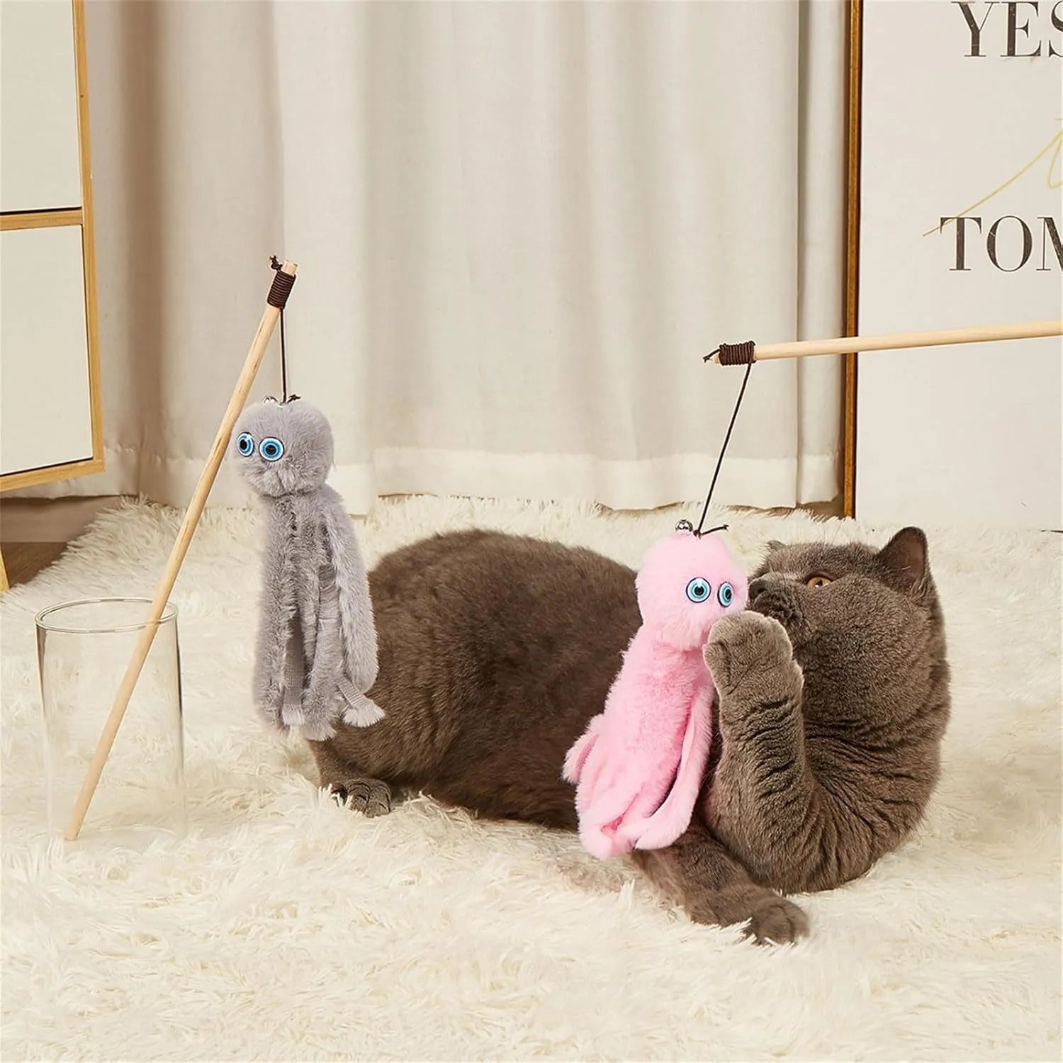 Furry octopus cat toy with eyes on 40cm long stick in pink colour for kitten play