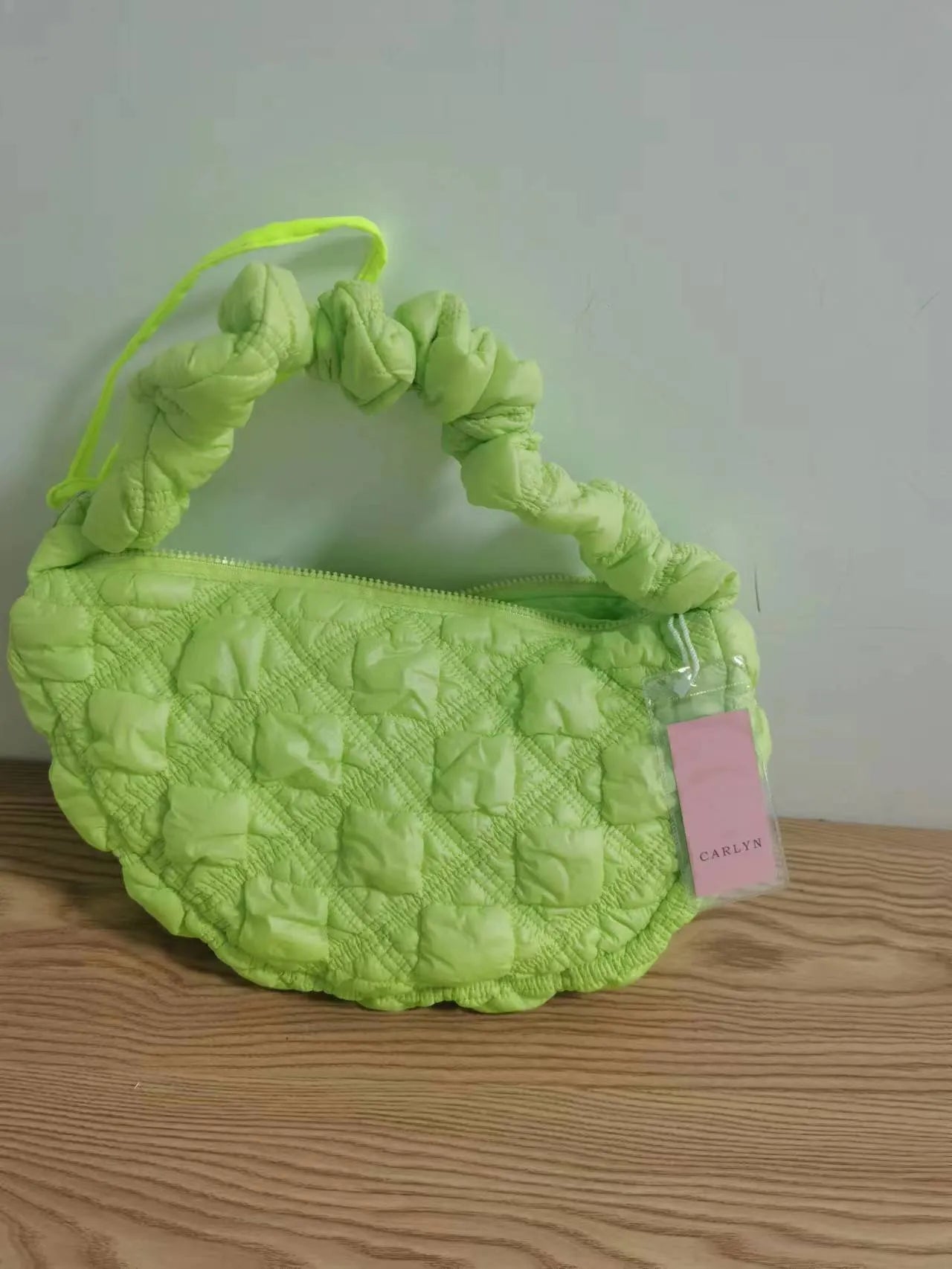 Women's casual nylon underarm messenger bag in beige colour showing dimensions and adjustable shoulder strap