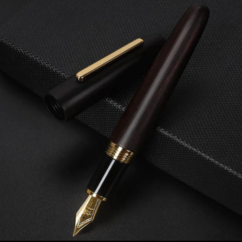 Wooden fountain pen with rotating cap showing choice of ebony, rosewood and tiger ebony finishes