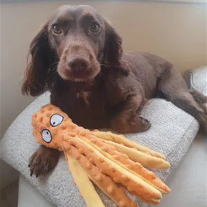 Blue octopus-shaped dog toy with tentacles, no stuffing, suitable for chewing and interactive play