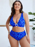 Blue floral patterned split bikini set for women in extended sizes.
