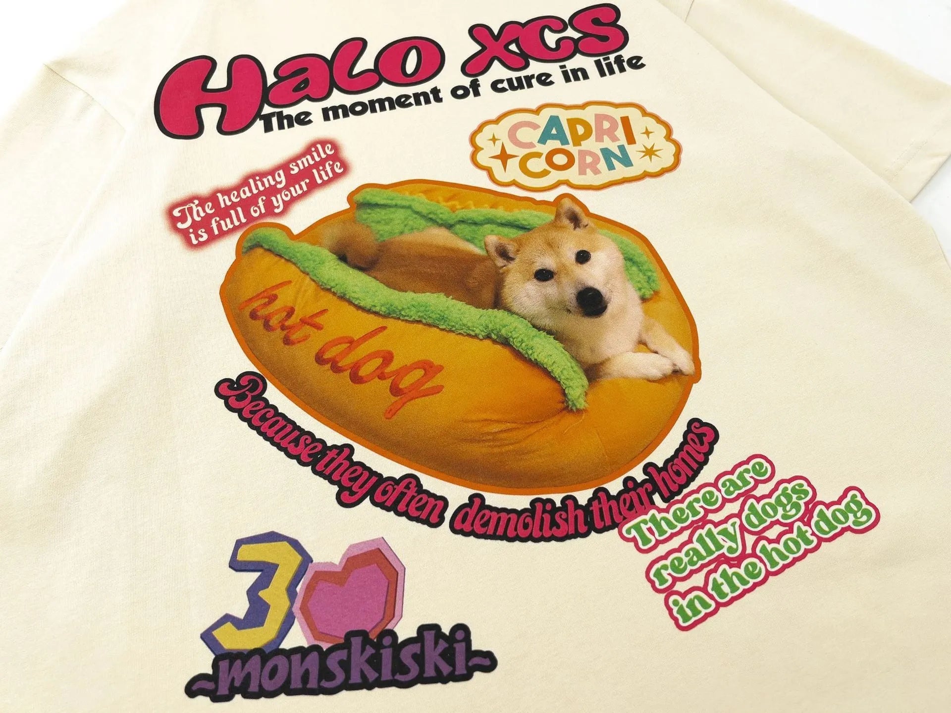 Cartoon hamburger dog printed loose fit cotton T-shirt in white, apricot, or sky blue colour.