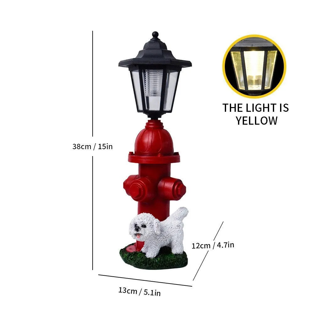 Solar hexagonal garden lamp with decorative resin figurine on plastic base for outdoor pathway lighting
