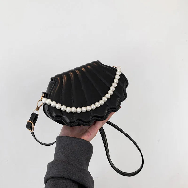 Women's simple messenger bag in PU shell shape with single shoulder strap, available in multiple colours