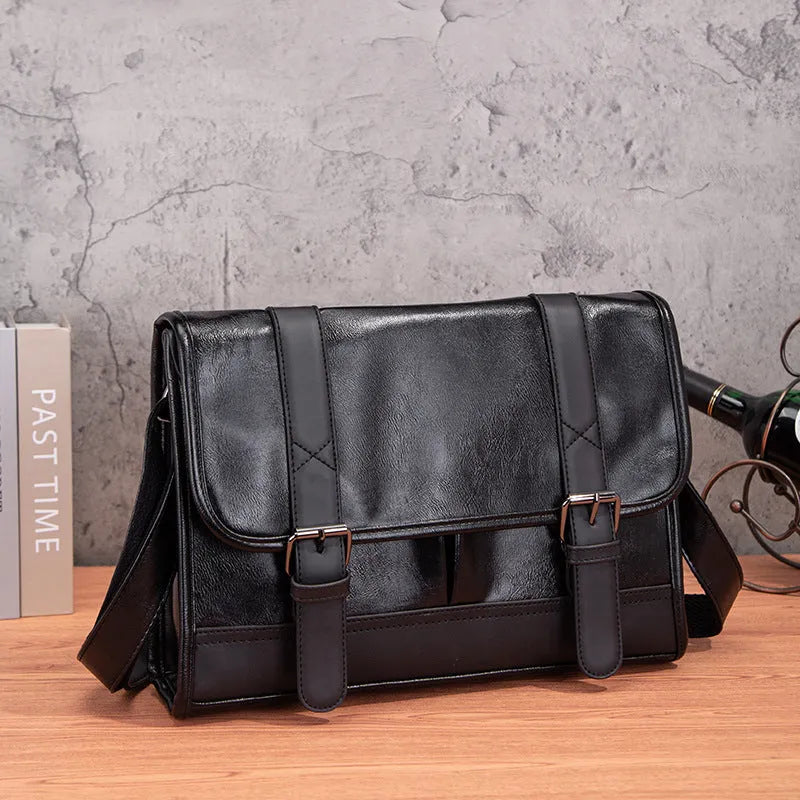 Black Korean-style men's anti-theft backpack with PU leather exterior and contrast stitching