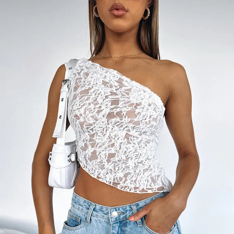 Women's sleeveless lace backless top with asymmetrical neckline in a solid colour.