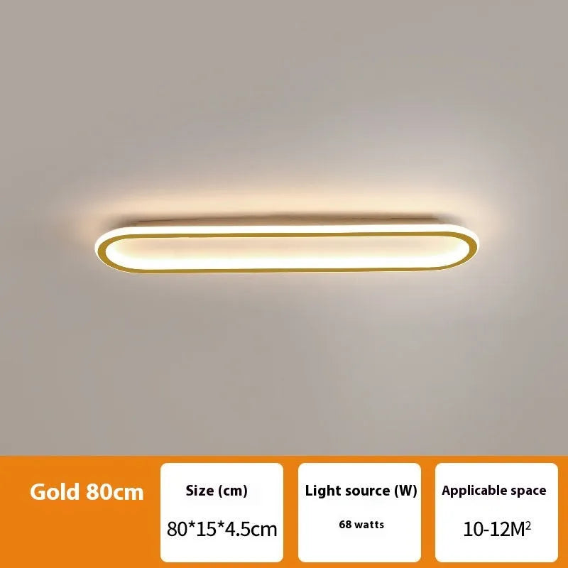 Black aluminium strip ceiling lamp with PVC shade in 60cm length mounted on a white ceiling.
