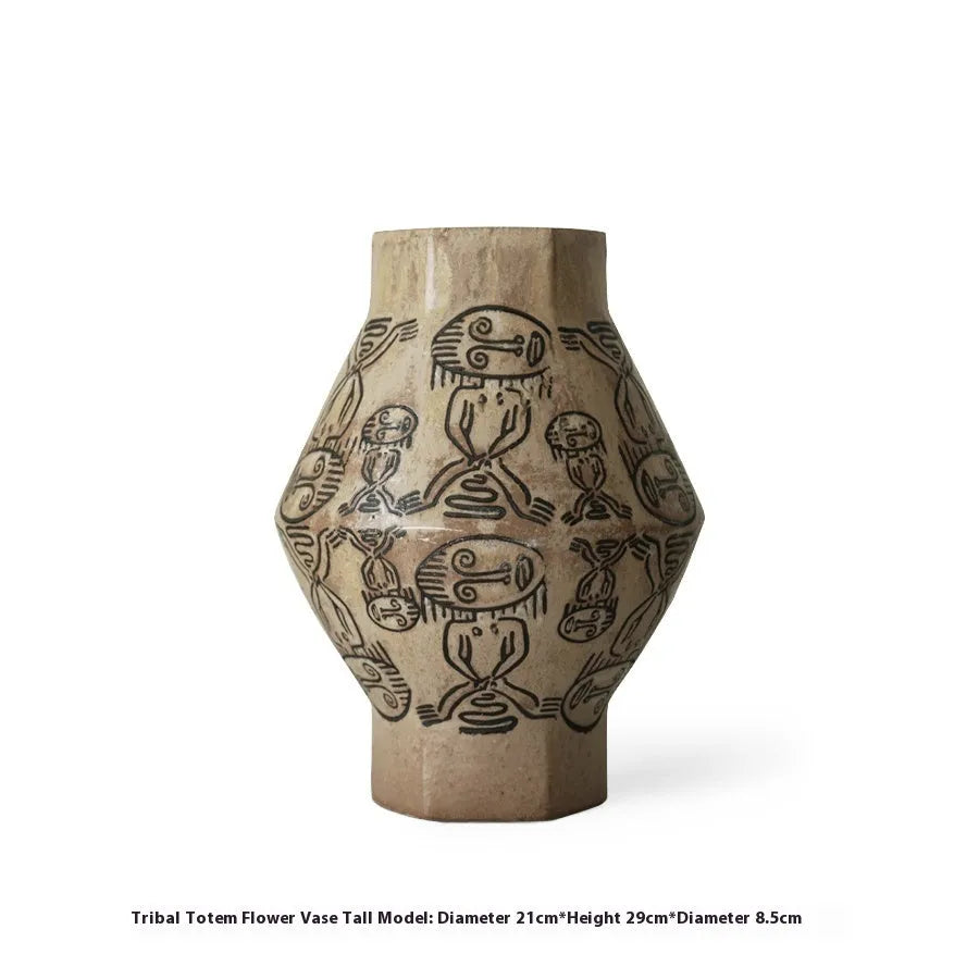 Hand-painted ceramic cylindrical vase with tribal totem patterns in vintage carved style