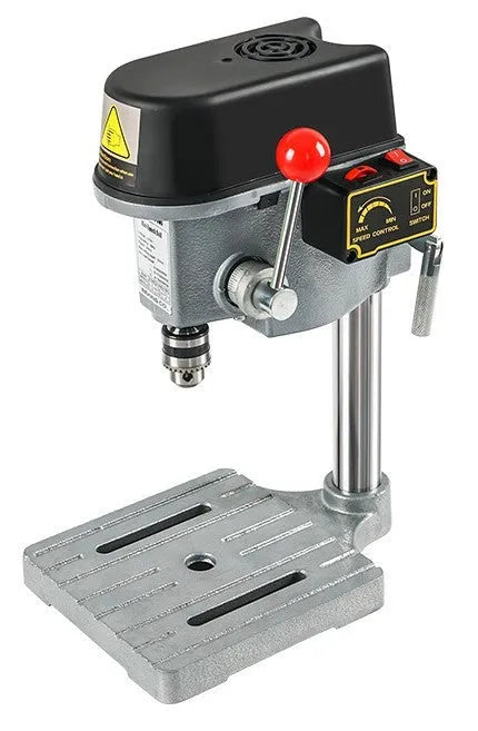 Mini bench drill milling machine with AC power supply and included bench pliers on workbench