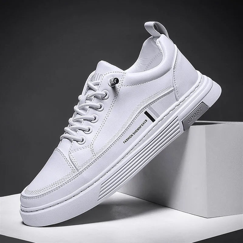 Men's white low-top skate shoes with microfibre upper, round toe, flat rubber sole and elastic band