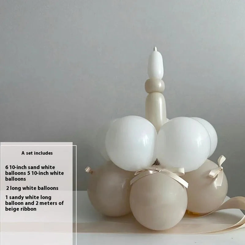 DIY balloon bouquet decoration kit with round balloons for cake toppers, showing one complete set.