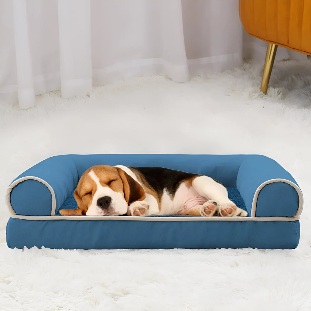 Square-shaped dog bed with sponge filling and breathable cloth cover, shown in blue colour.