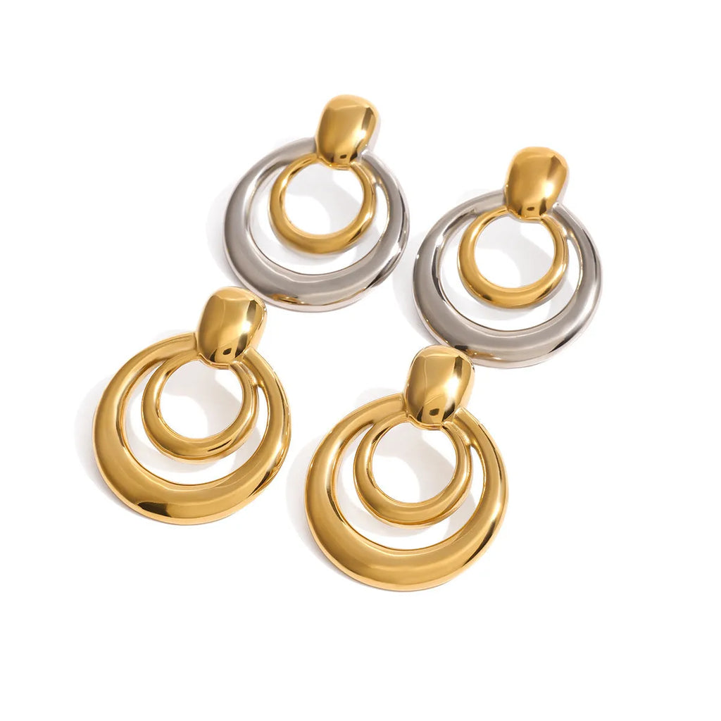 Golden round stud earrings with double-layer hollow geometric design on titanium steel