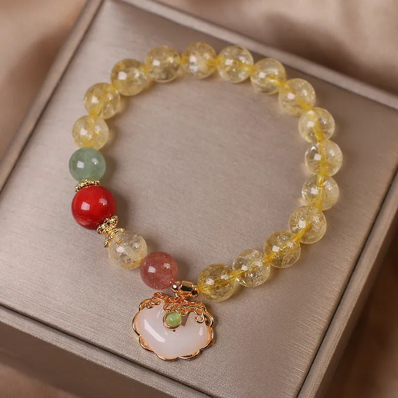 Women's alloy bracelet with a yellow citrine jade ruyi pendant in an original design.
