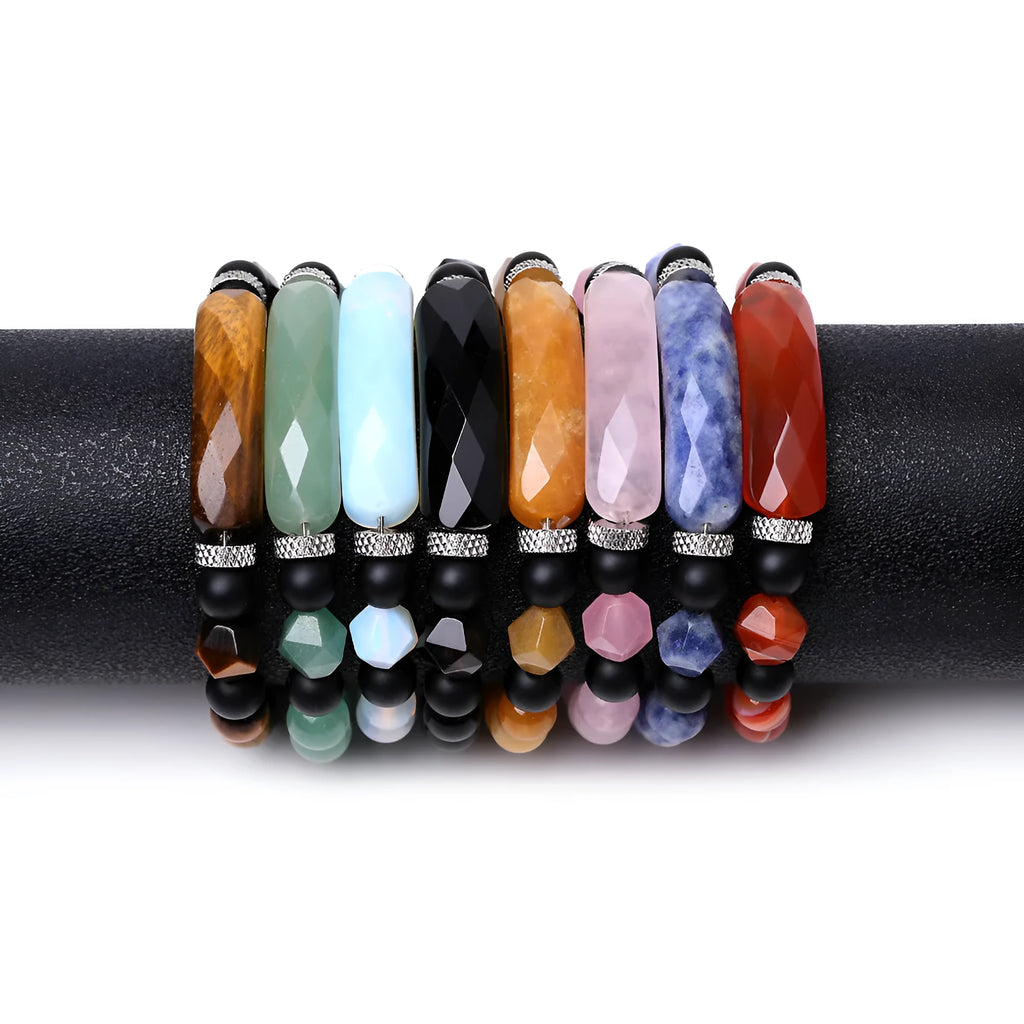 Handmade geometric bracelet with diamond-cut black agate beads and fan-shaped design elements.