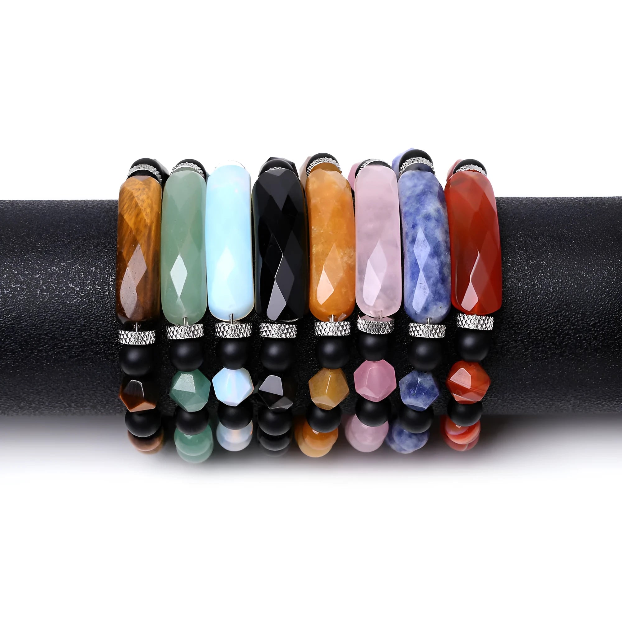 Handmade geometric bracelet with diamond-cut black agate beads and fan-shaped design elements.