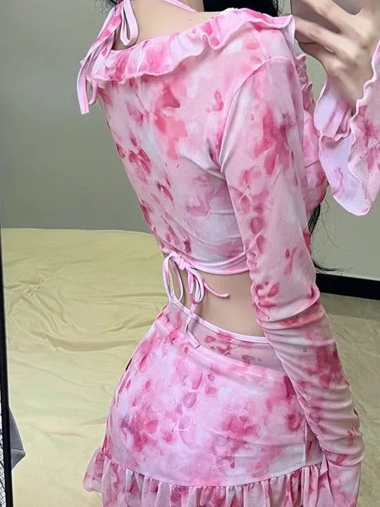 Women's cherry blossom pink floral swimsuit with high-leg design and Asian fit sizing