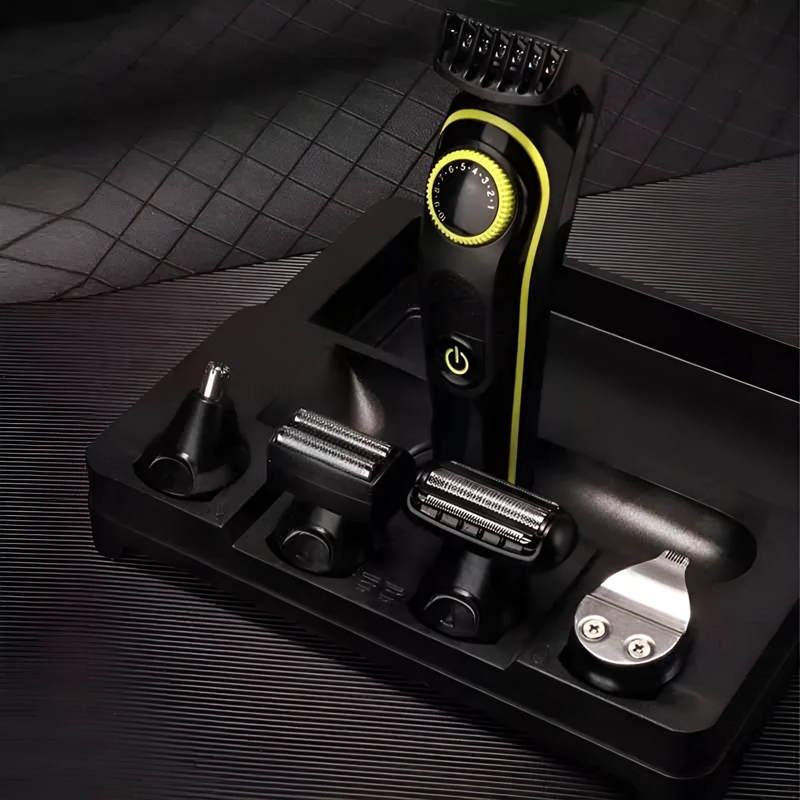 Black KM-696 household electric hair clipper set with USB charging cable and cleaning brush.