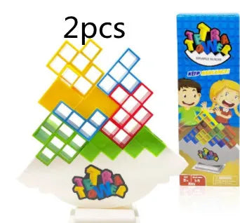 Balance stacking board game with 16 plastic coloured building blocks, base and chassis on a flat surface