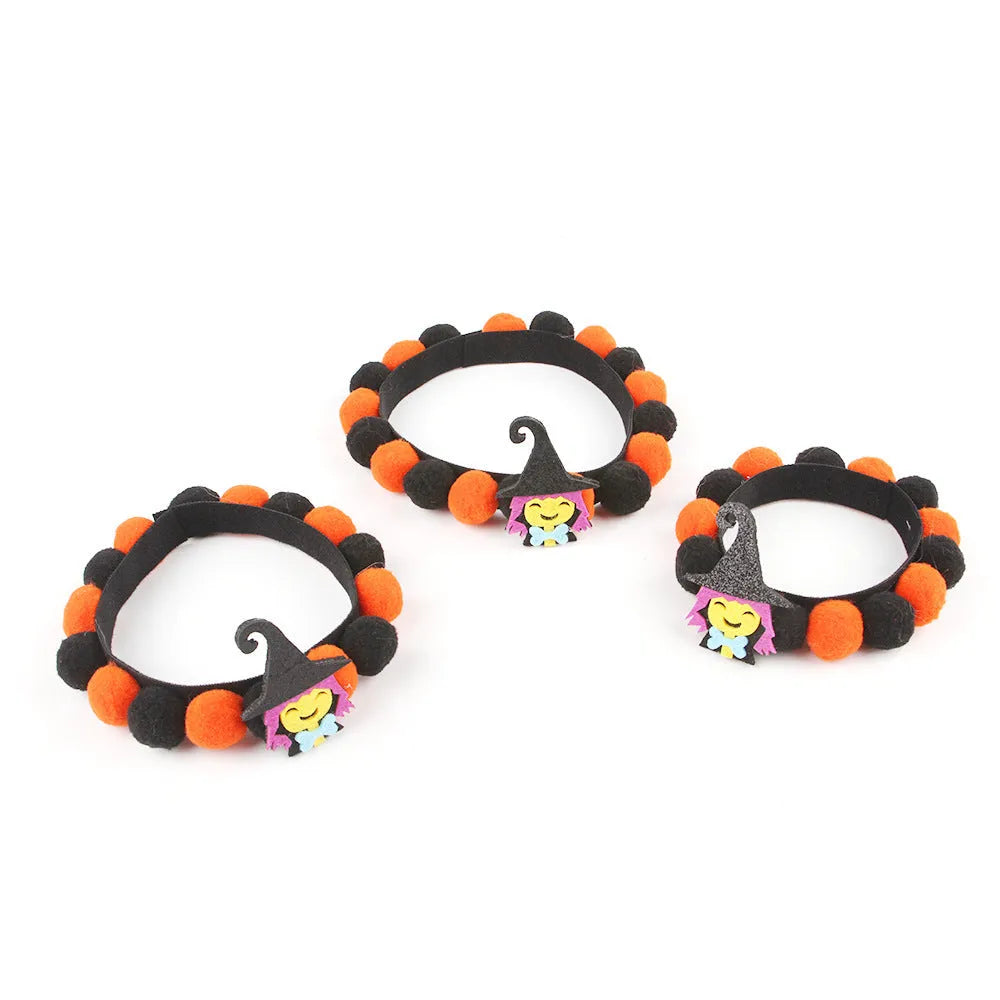 Halloween pet collar with fur ball pumpkin decoration in six colour and theme variations