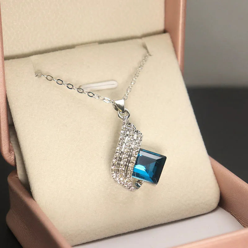 Women's jewellery set with electroplated alloy pendant, glass beads, and cross chain necklace with matching ear studs