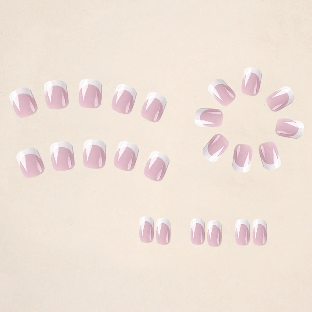 24 white fake nail plates with a black and white plaid pattern, shown in a nail tip style.