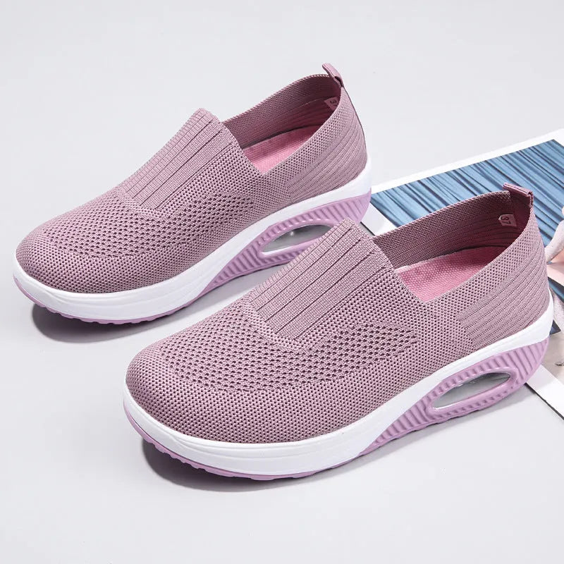 Women's mesh running shoes with air cushion technology in multiple colour options