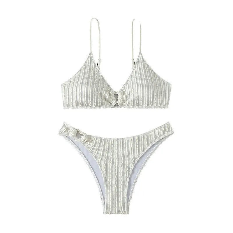 White women's V-neck beach swimsuit two-piece set with sleeveless top and split shorts