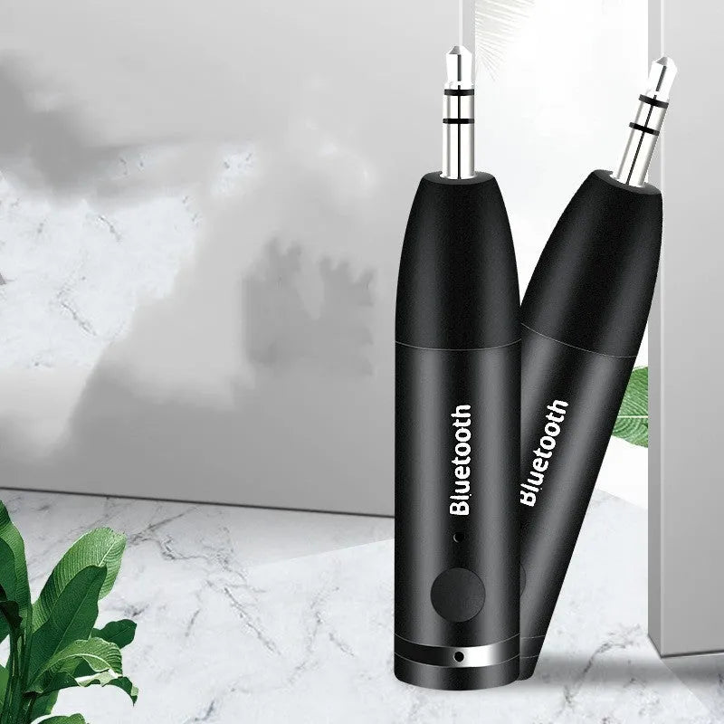 Black Bluetooth audio receiver with 3.5mm AUX connector for car and home stereo systems