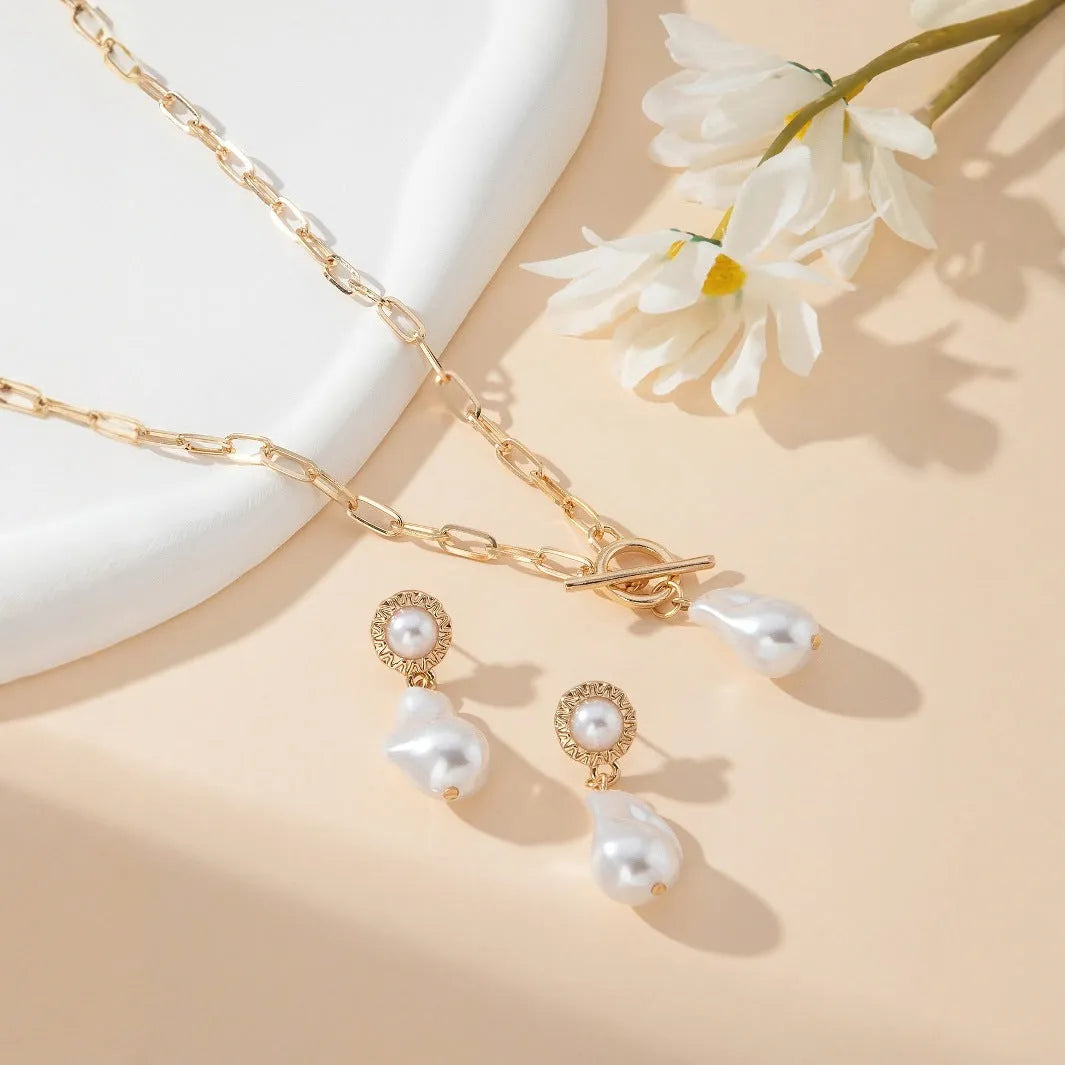 Gold-coloured baroque pearl necklace and earrings two-piece jewellery set