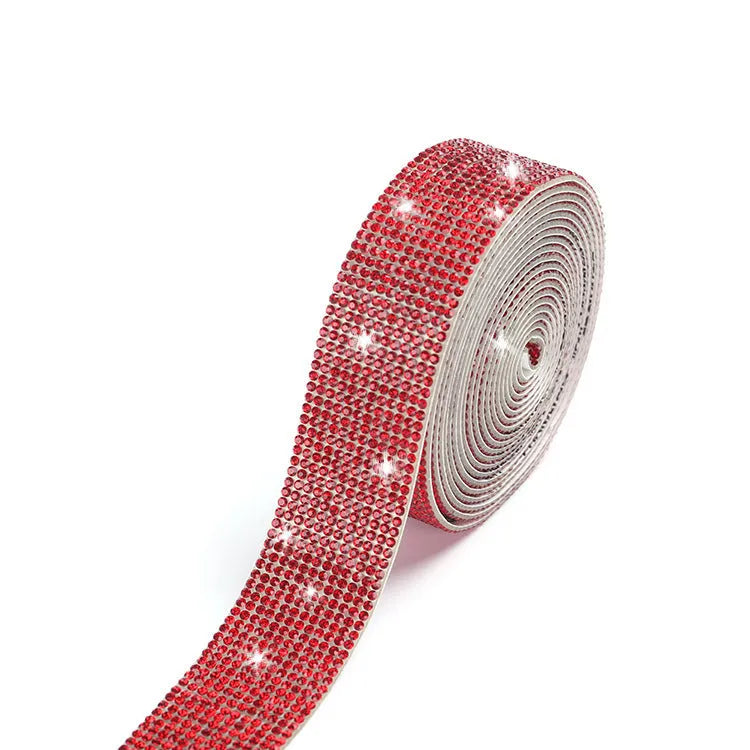 A one-yard long self-adhesive electroplated glass rhinestone strip on a roll, shown in white and AB colour variants.