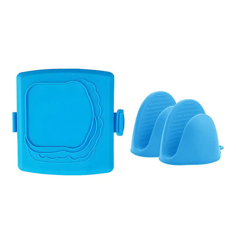Red silicone baking tray and matching anti-scald gloves set in colour box packaging.
