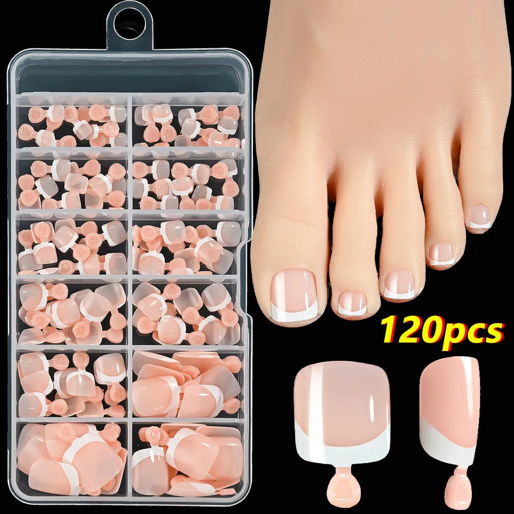 Open box showing 120 French white tip nude square false toe nails in assorted shades.