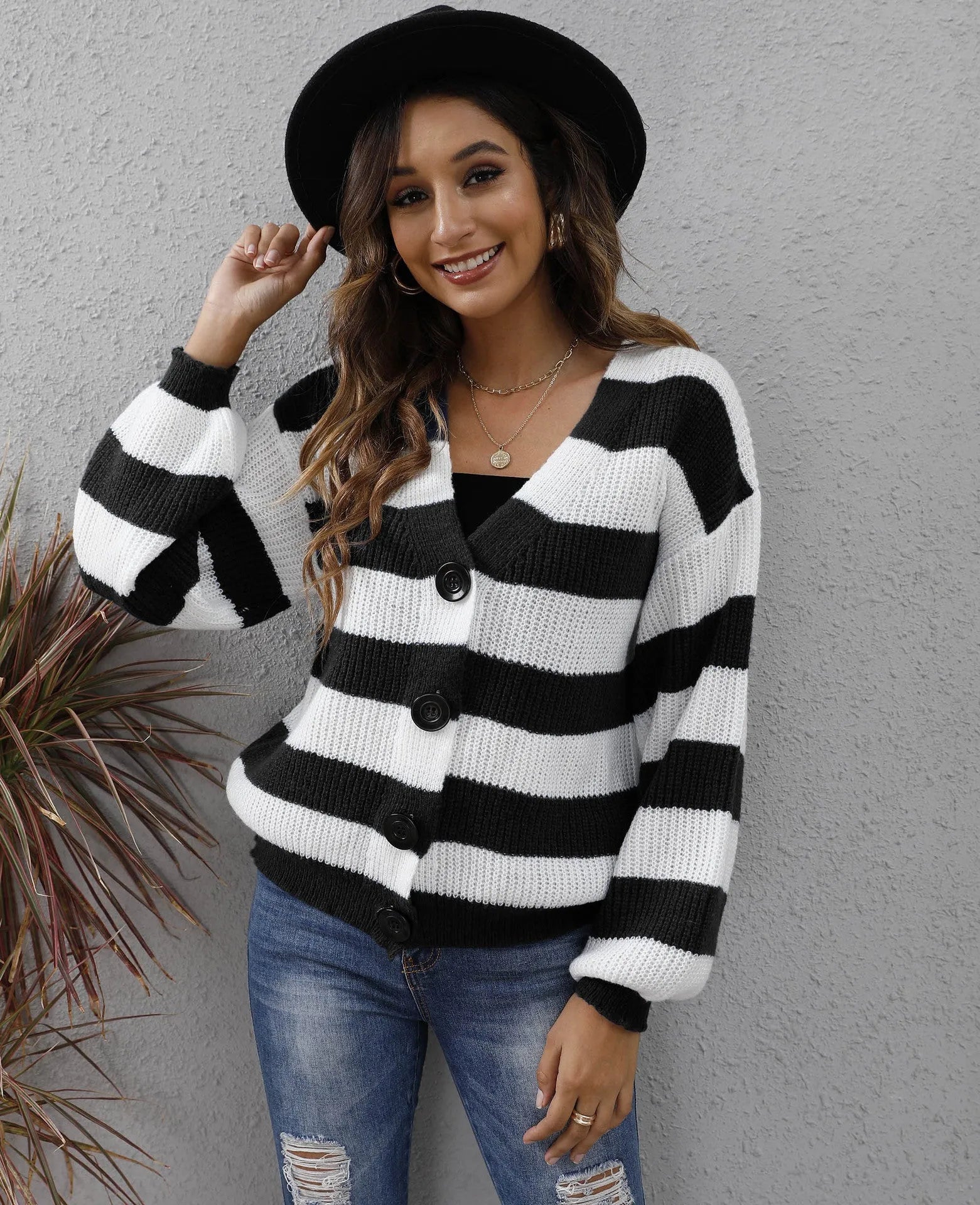 Women's striped cardigan sweater with button front in deer plush polyester fabric