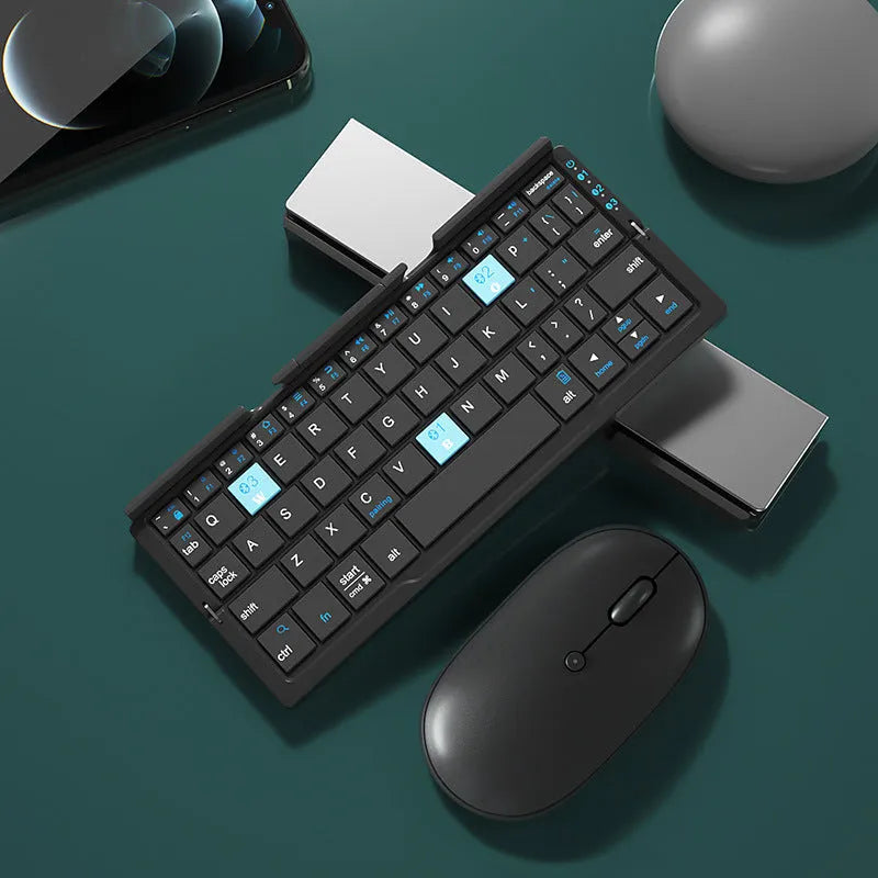 Silver white folding Bluetooth keyboard open with phone on stand and closed showing compact size