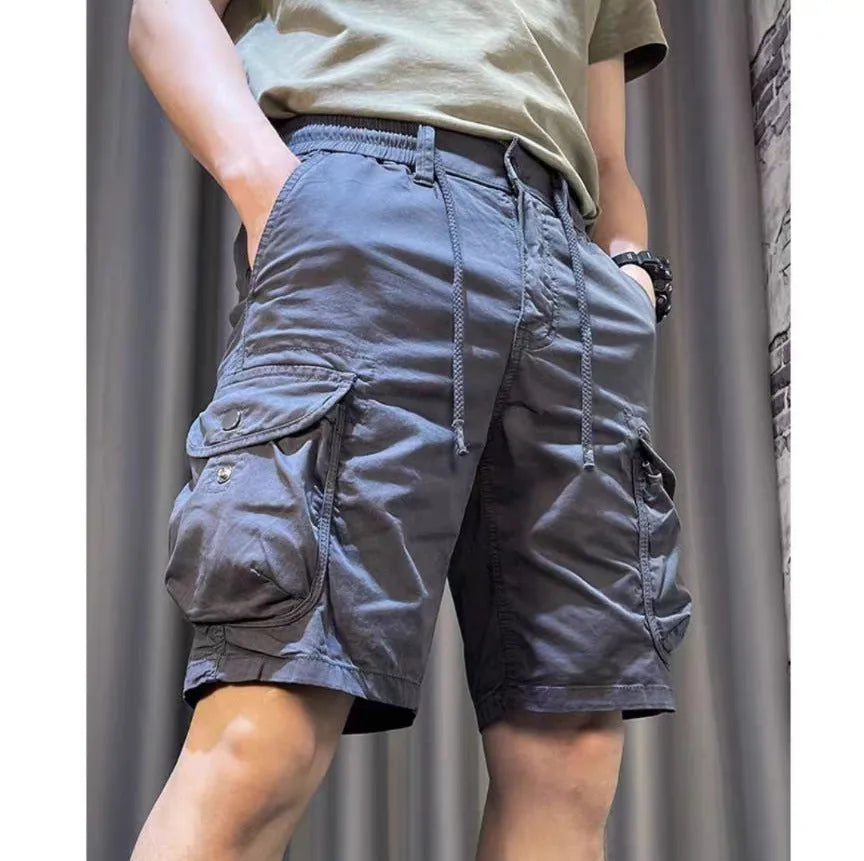 Korean style loose straight-leg casual overalls pants with multiple pockets in black.
