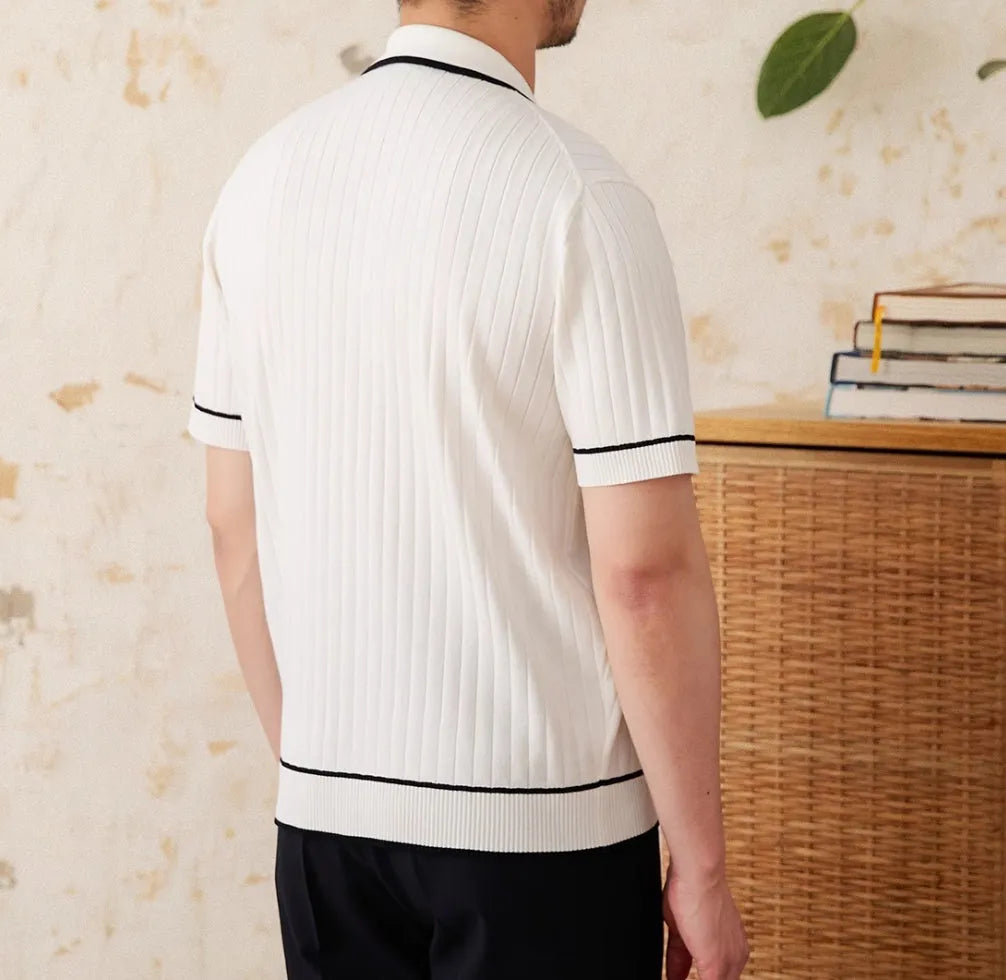 Men's slim-fit black lapel polo shirt with short sleeves made from elastic viscose blend knit fabric.