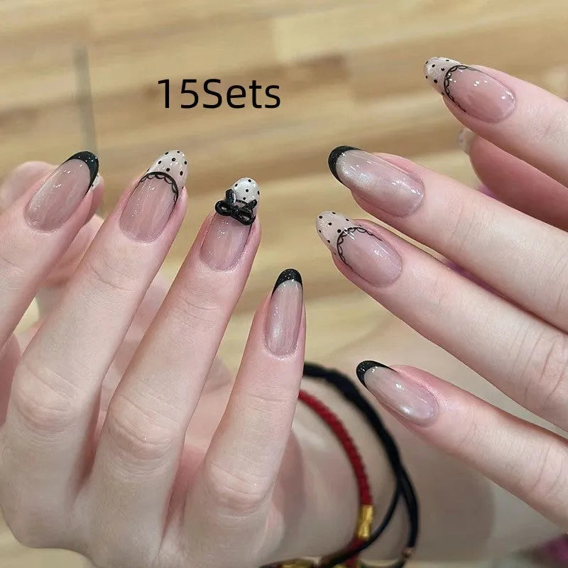 Assorted fake nail sets for girls in various colours and patterns.