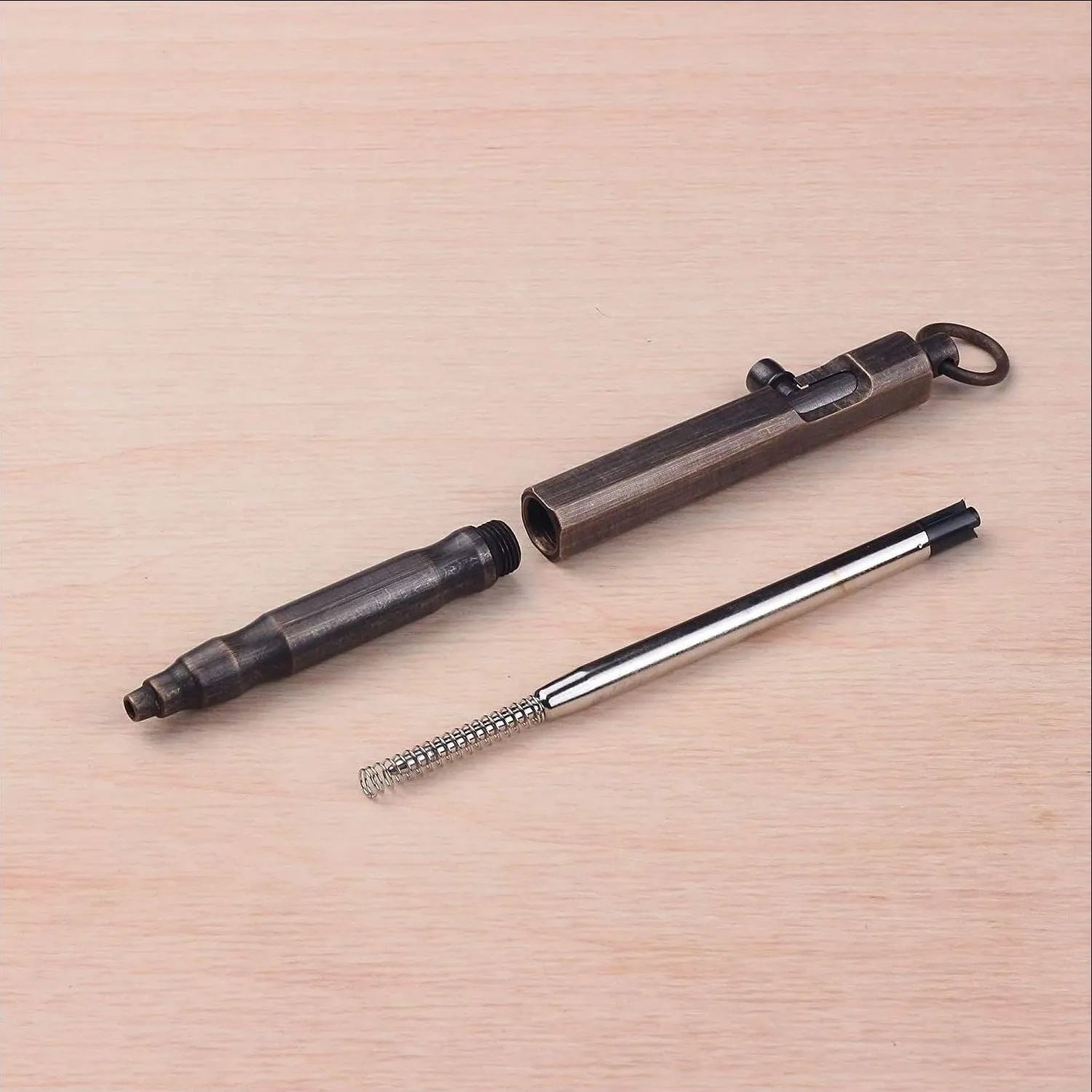 Brass hexagonal tactical pen in natural colour or black finish, 13cm length with bolt design