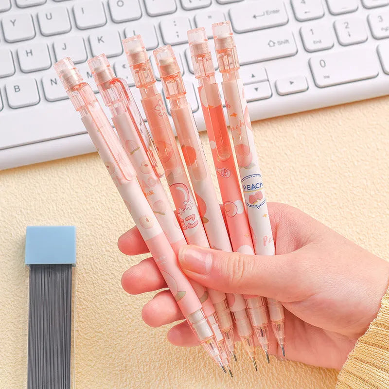 Peach plastic automatic pencil press 0.5mm lead with refills, no sharpening required