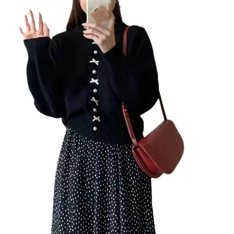 Women's solid colour cardigan sweater with bow and pearl button design in medium thickness fabric
