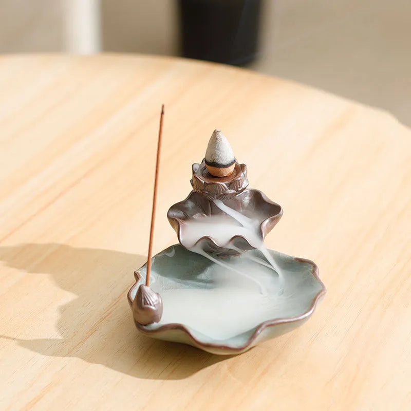 Square ceramic reverse flow incense burner with lotus and plum blossom decorative motifs